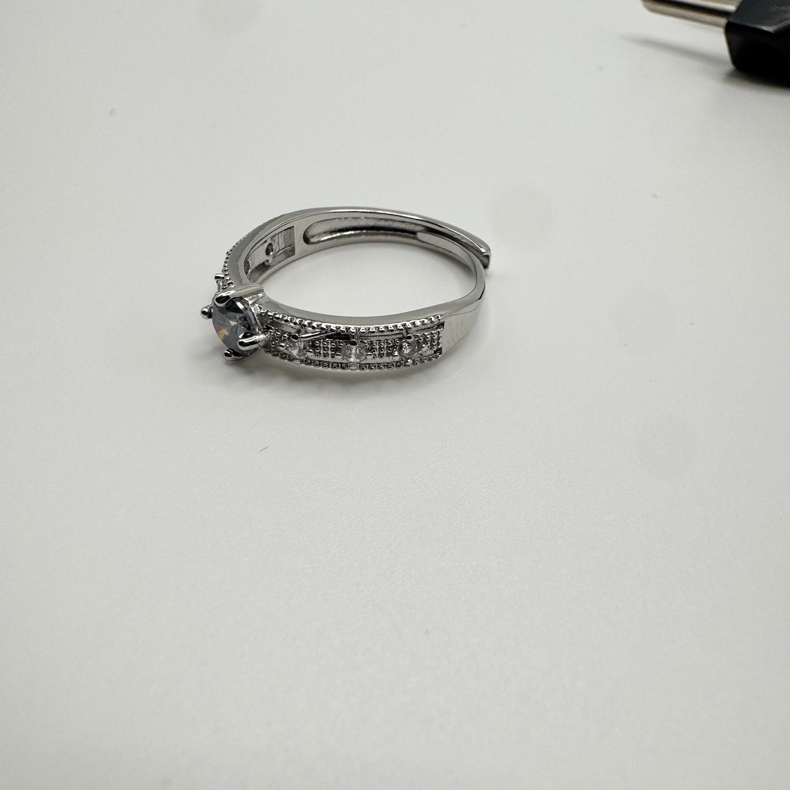 Vintage Style Silvertone Adjustable Ring With Blue CZ Stone