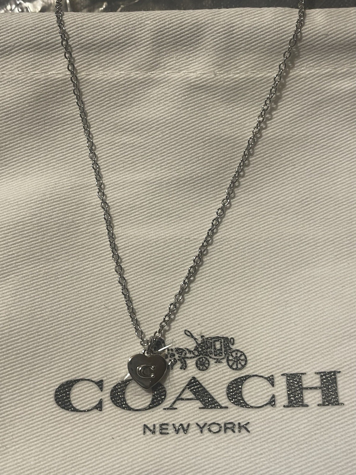 Coach Silver Tone Heart Charm Pendant Necklace & Coach charm bracelet