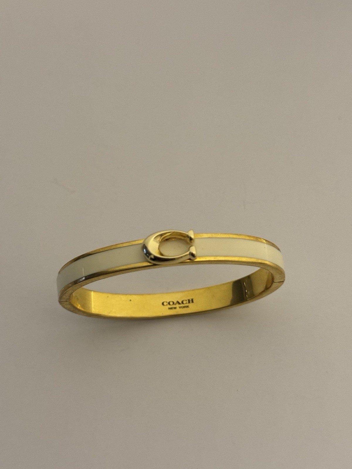 Coach Gold Tone White Enamel Oval Bangle Bracelet Signed No Stone