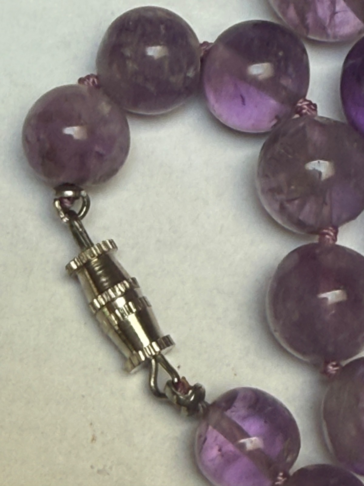 Hand polished amethyst 41 beaded graduated knotted 21.5” necklace