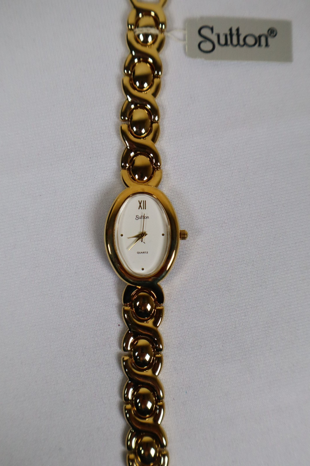 Sutton Quartz Watch Gold Tone Oval Face NIB Needs New Battery ONE YEAR WARRANTY
