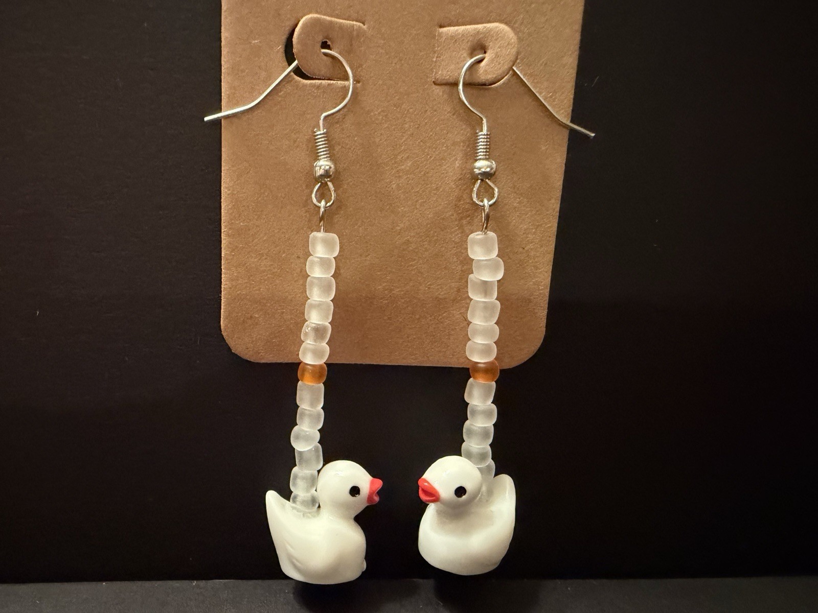 Handmade ooak white dangle drop duck earrings with frosted glass bead details