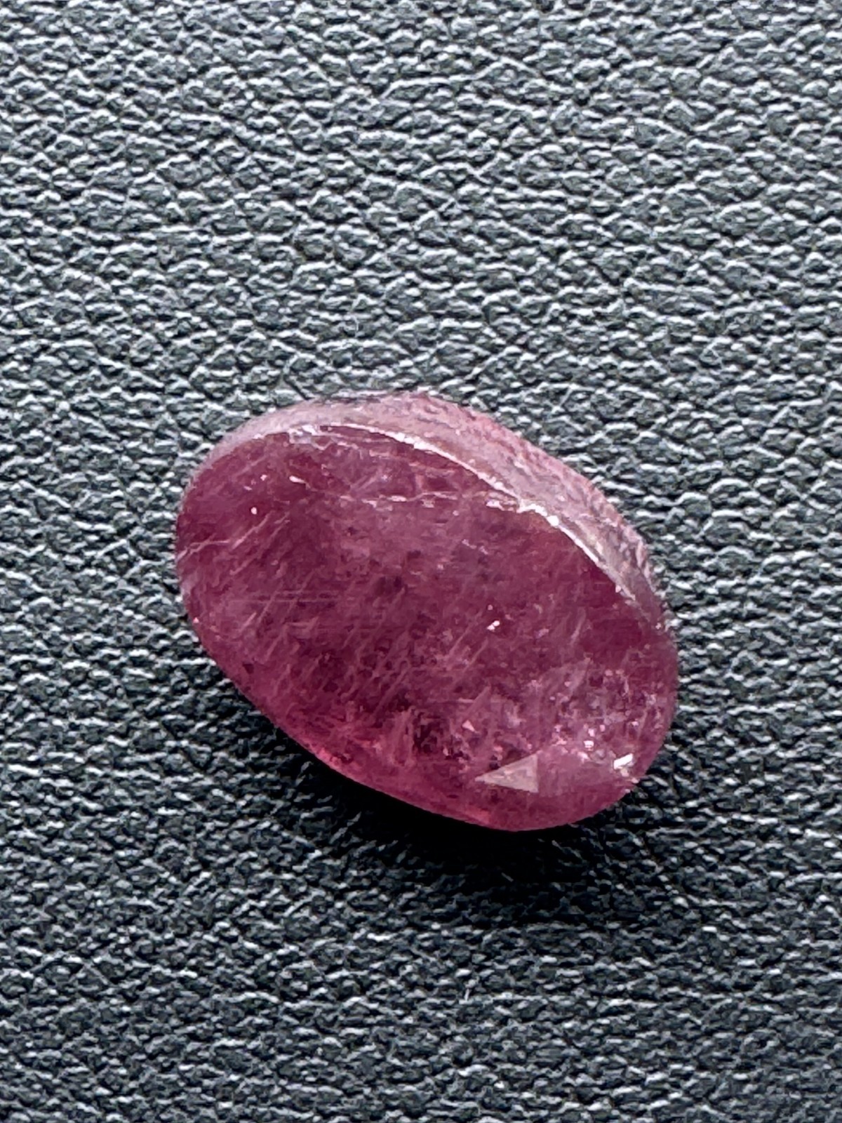 Dark Purple Red RUBY. 12 x 10 mm Oval, Slight Inclusion. 8.1 Carats.