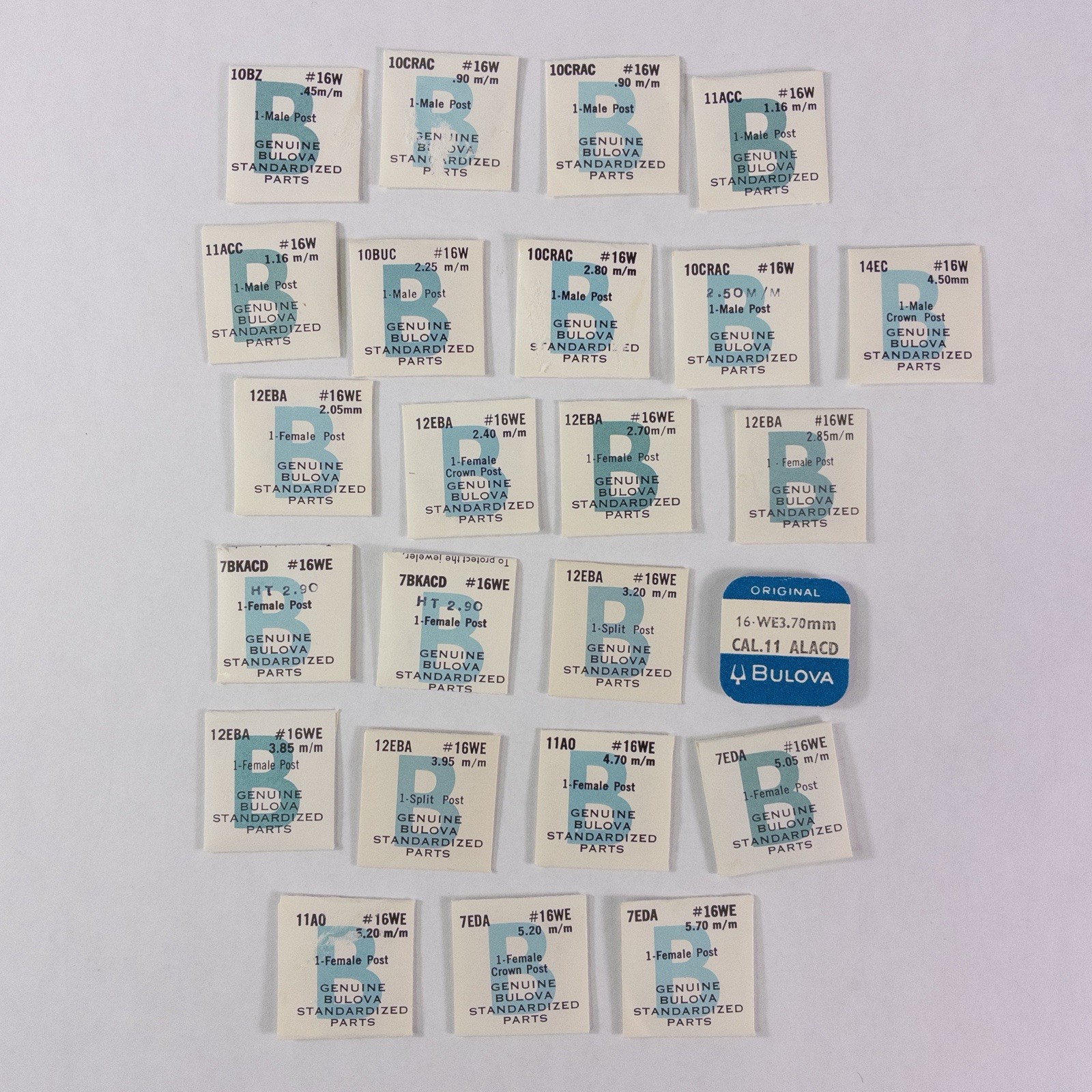Lot of 24 NOS Bulova Male / Female Posts Watch Parts Unopened