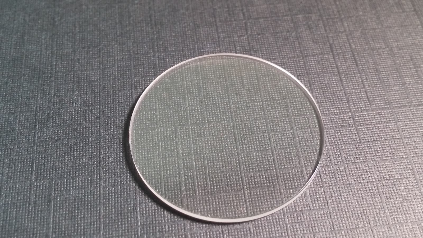 Unbranded Sapphire Crystal – 25.4mm diameter by 1.3mm thick. dome