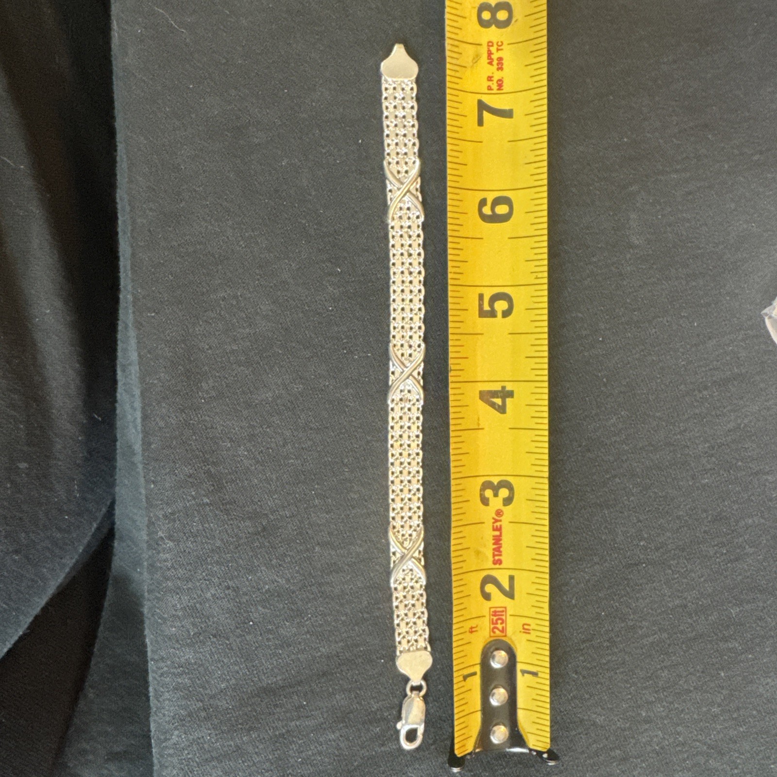 Silver .925 Stretch Bracelet Size 7 1/2 With X Design ￼