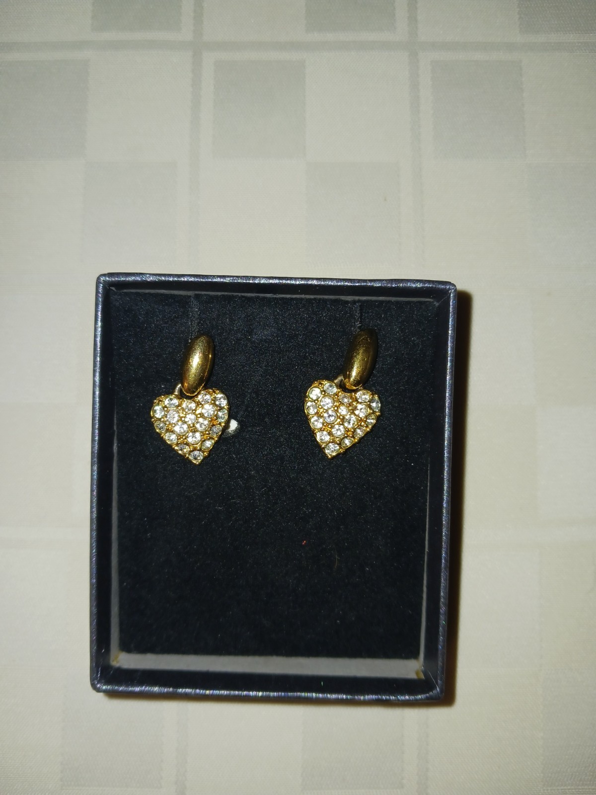 Swarovski crystal pave heart pierced post earrings. Makes any outfit elegant.s