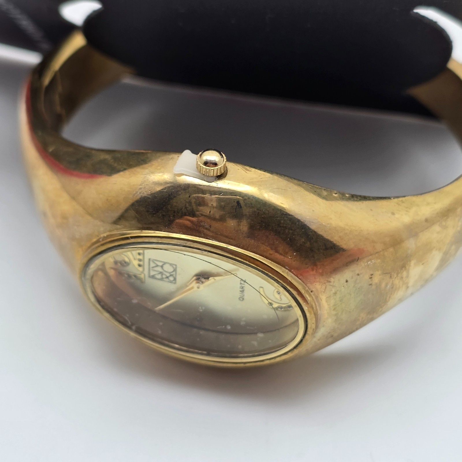 NY & Co Gold Tone Clamper Watch 35mm Cuff Bracelet 6.5 in Quartz Oval New w/Tags