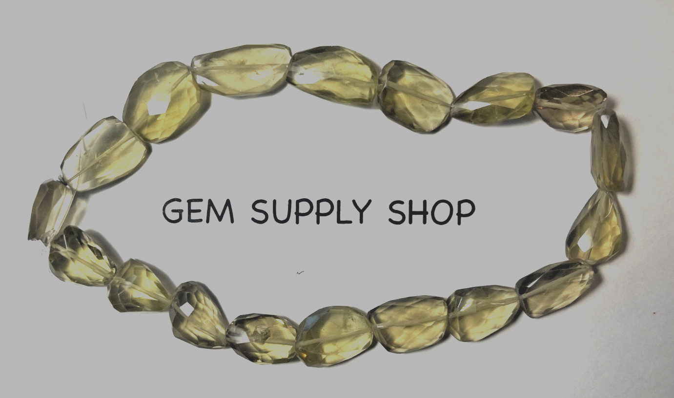 LEMON CITRINE FACETED NUGGET SHAPE 22X16 MM 14.5 INCH STRAND BELOW WHOLESALE