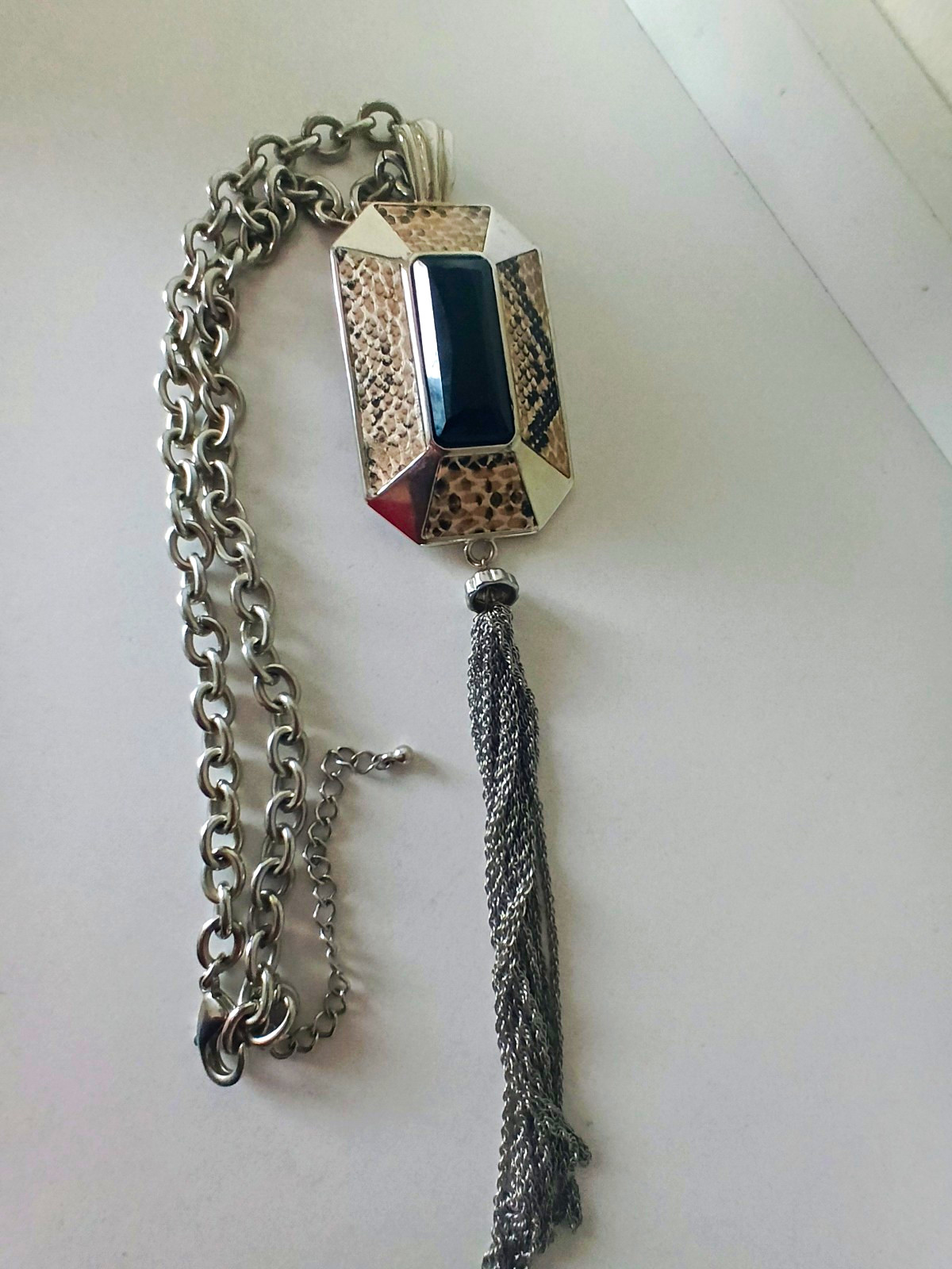 Silver Chain w/ Large Black Pendant Surrounded By Snake Print and Long Tassles