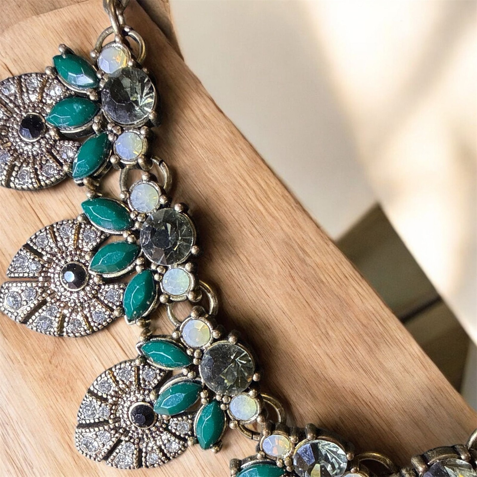 Stella & Ruby Gold Tone Statement Necklace with Green and Iridescent Faux Stones