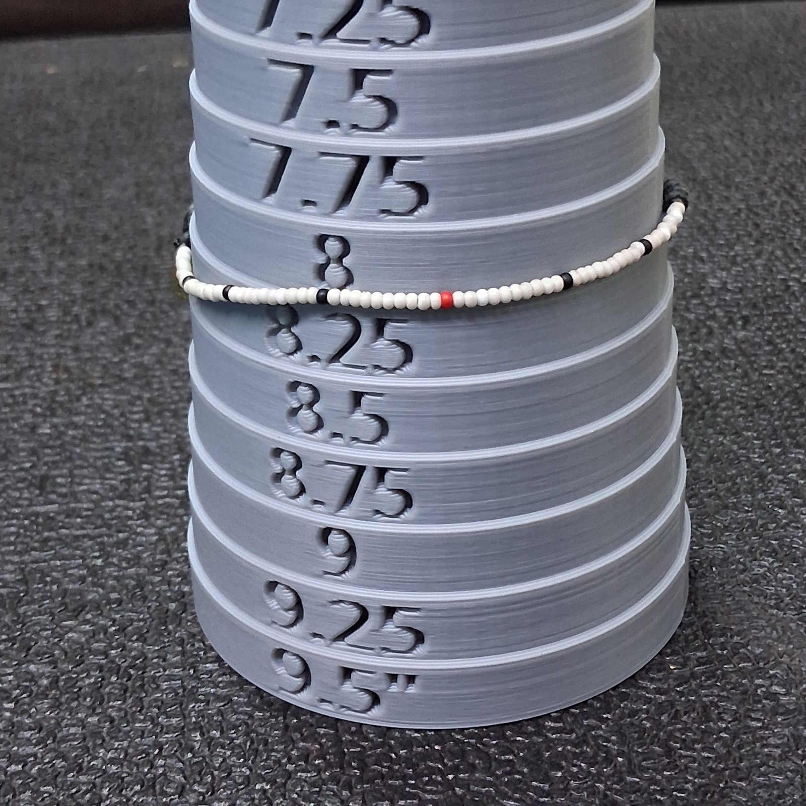 Bead Relief White Channel Set Stone Bead Black Cotton Cord Bangle Bracelet