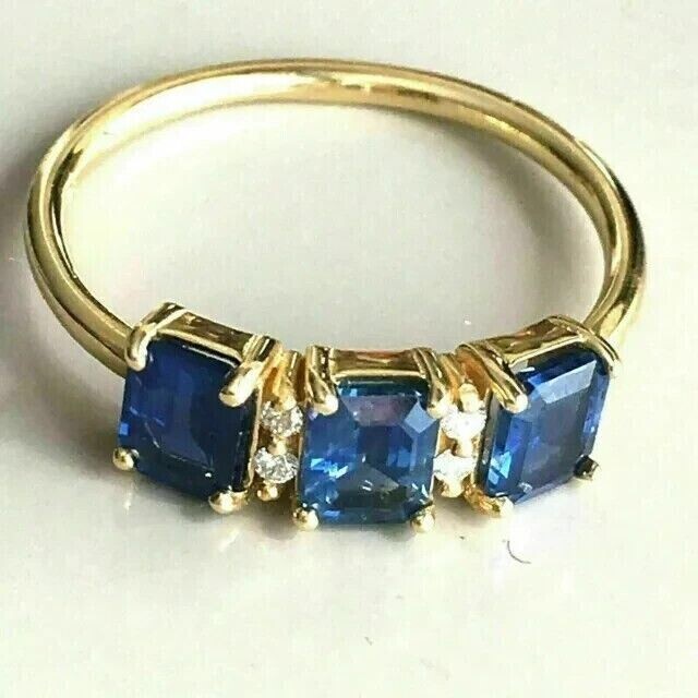 3.CT Three Stone Wedding Ring Lab Created Sapphire 14K Yellow Gold Plated Silver