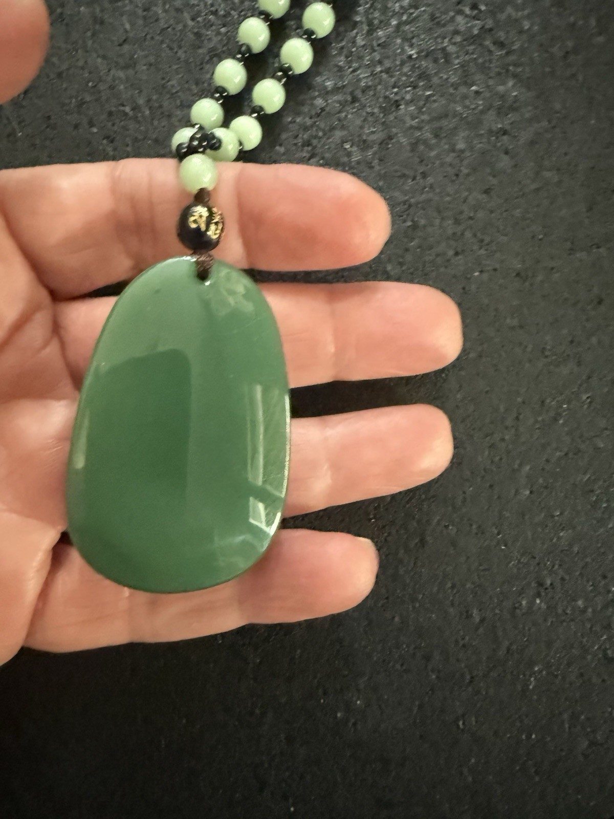 Vintage Asian jade green and black beaded necklace Asian figure 30″