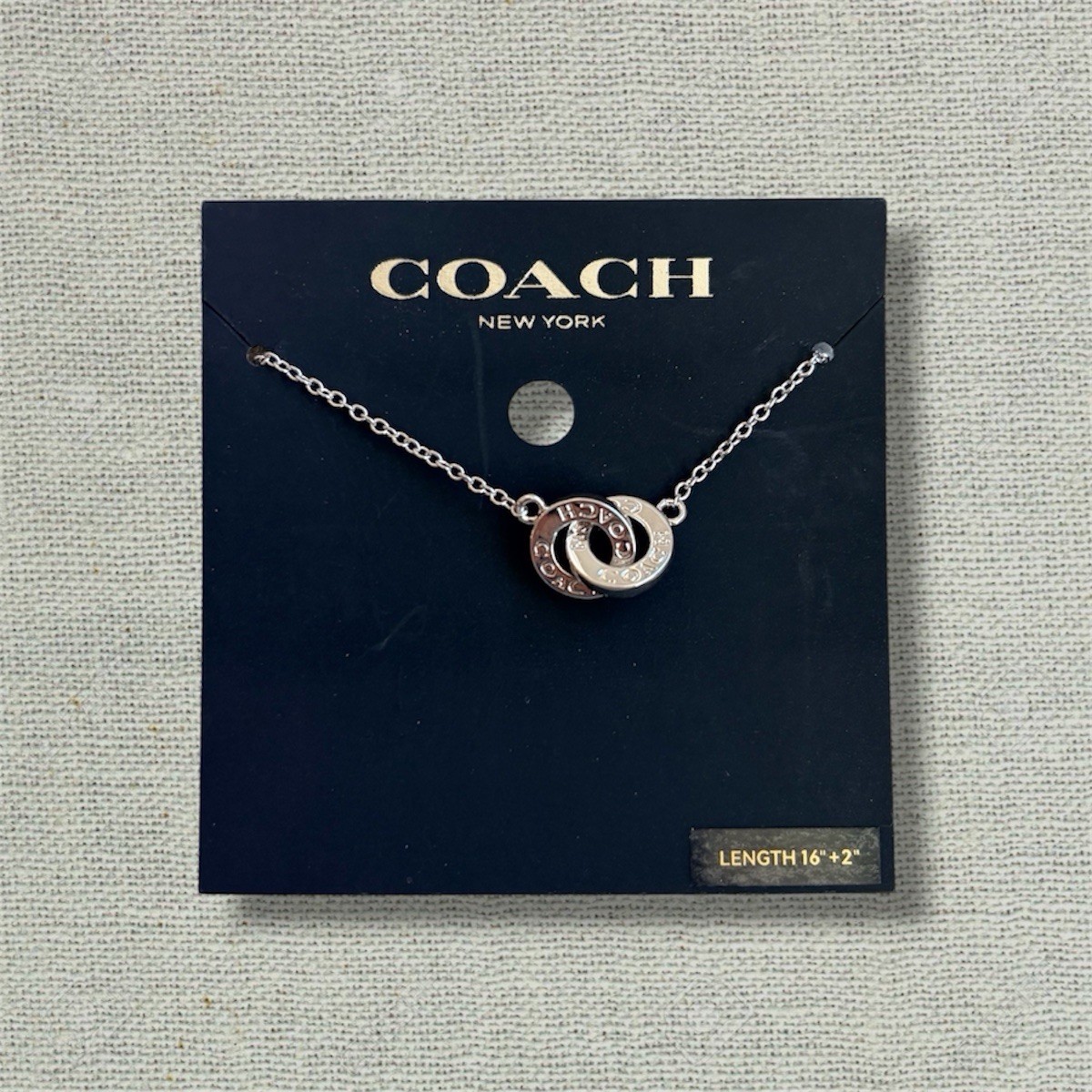 Authentic Coach Silver Interlocking Ring Necklace 16″+2″ Chain New w/ Card