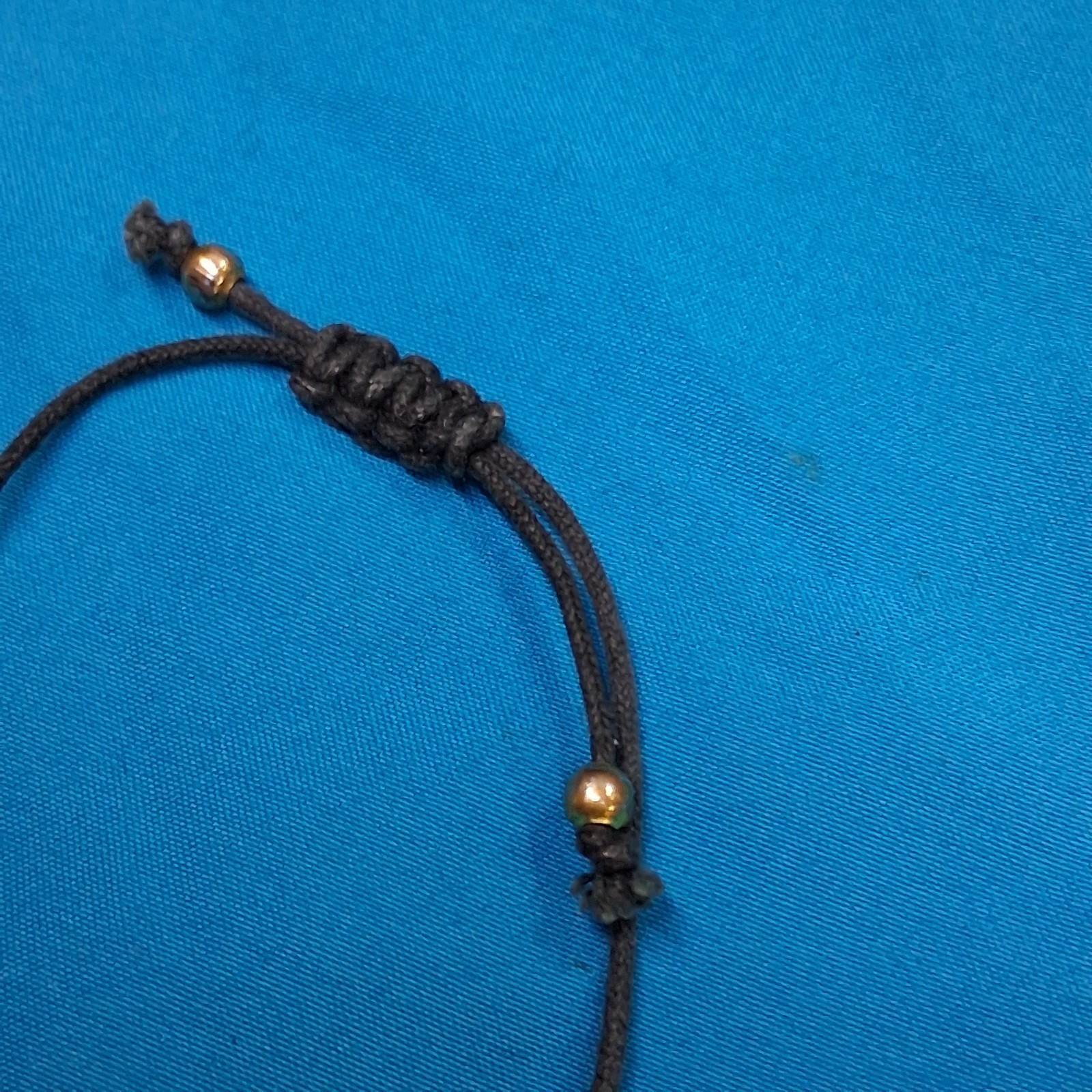 Bead Relief White Channel Set Stone Bead Black Cotton Cord Bangle Bracelet