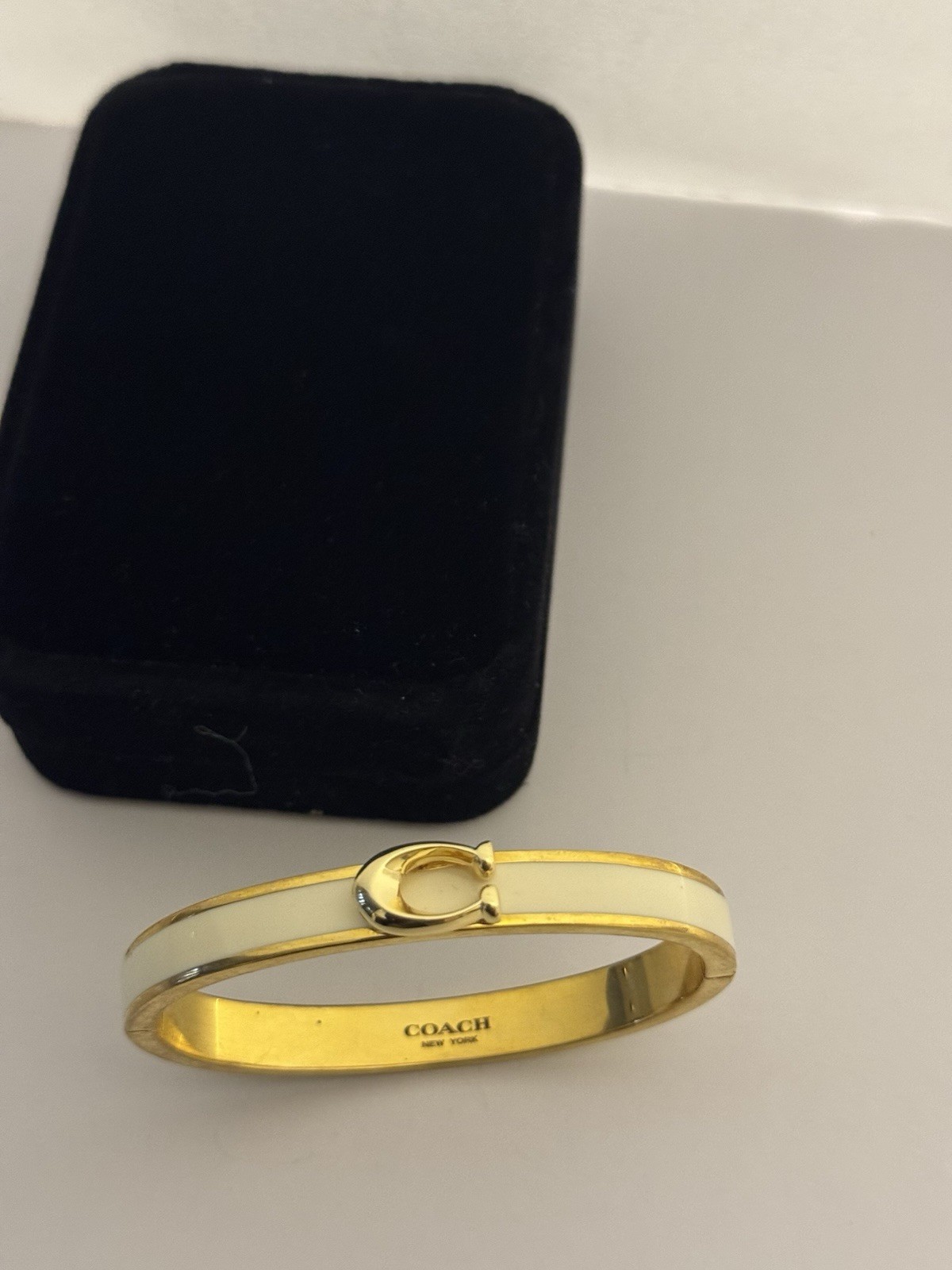 Coach Gold Tone White Enamel Oval Bangle Bracelet Signed No Stone