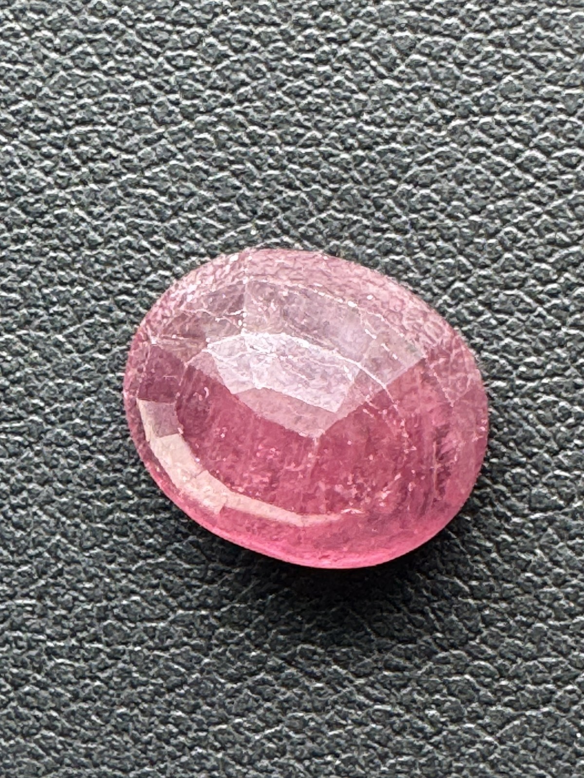 Dark Purple Red RUBY. 12 x 10 mm Oval, Slight Inclusion. 8.1 Carats.
