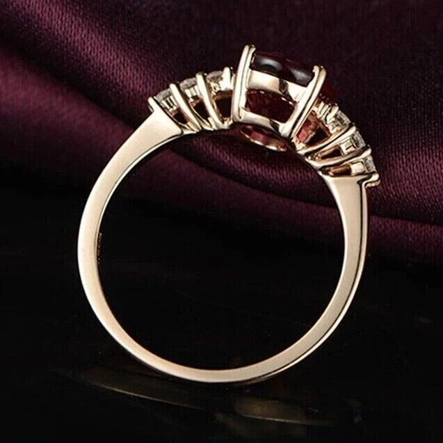 3.00 Ct Oval Cut Lab Created Ruby Halo Engagement Ring In 14K Rose Gold Plated.