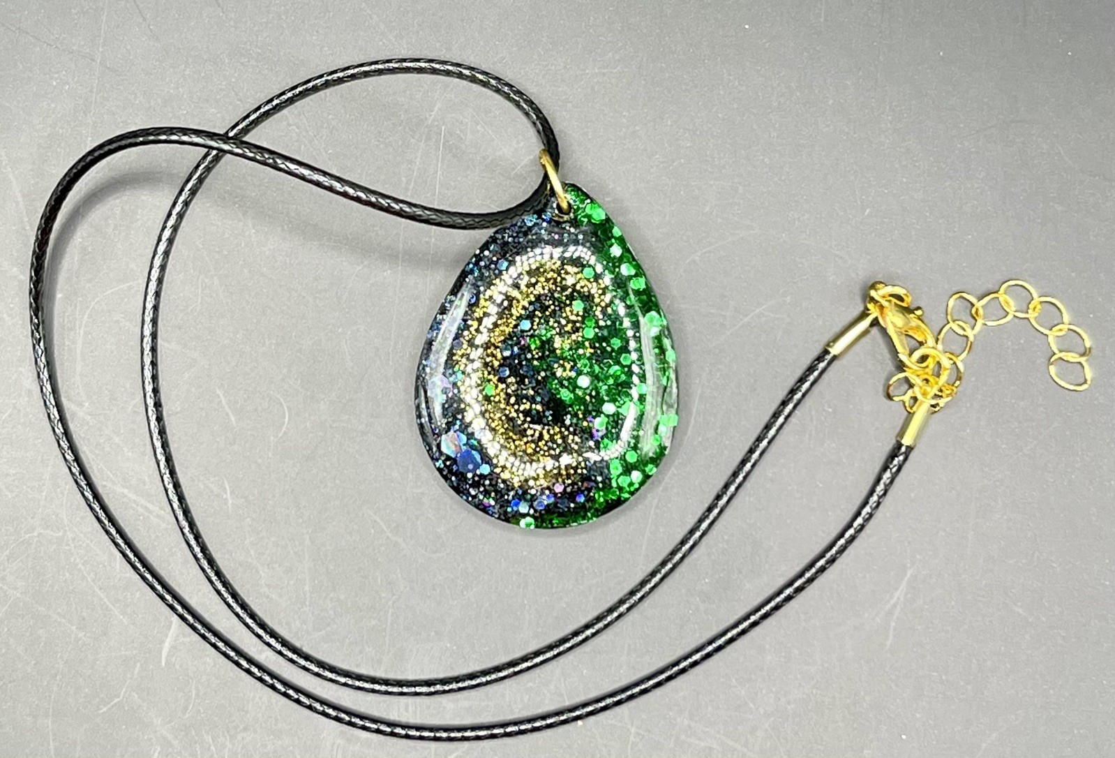 Handmade Resin Teardrop Pendant, blue/green/gold Glitter Swirl, 18” Cord
