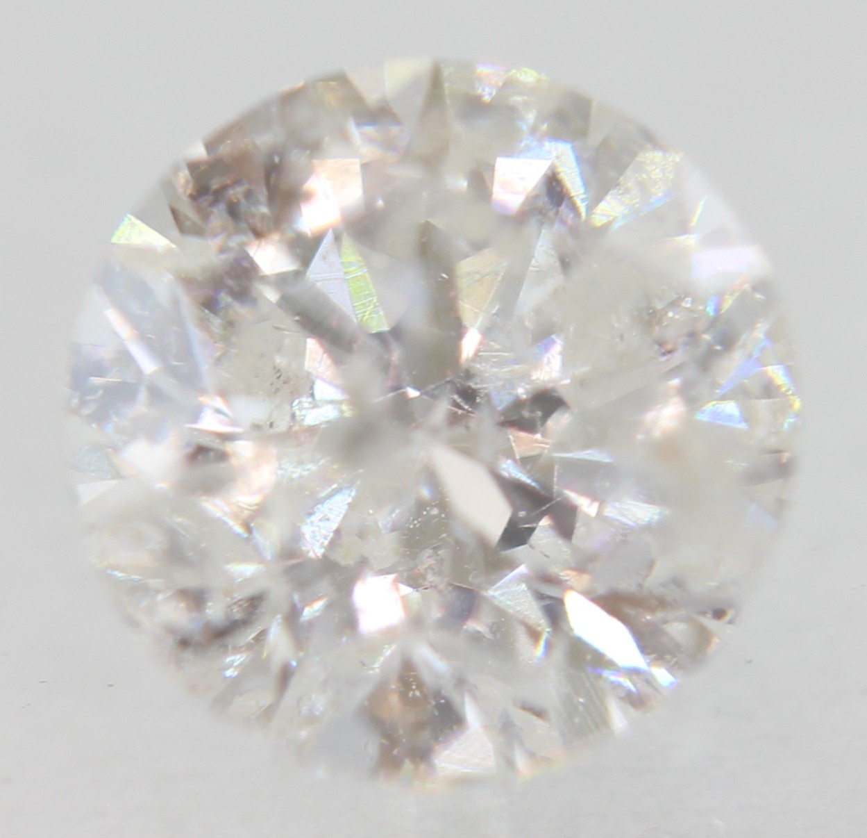 Certified 0.62 Carat E SI2 Round Brilliant Natural Enhanced Loose Diamond 5.32mm