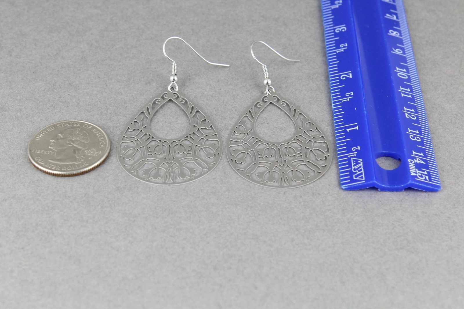 Silver teardrop filigree dangle earrings shiny 2 7/16″ long lightweight scroll
