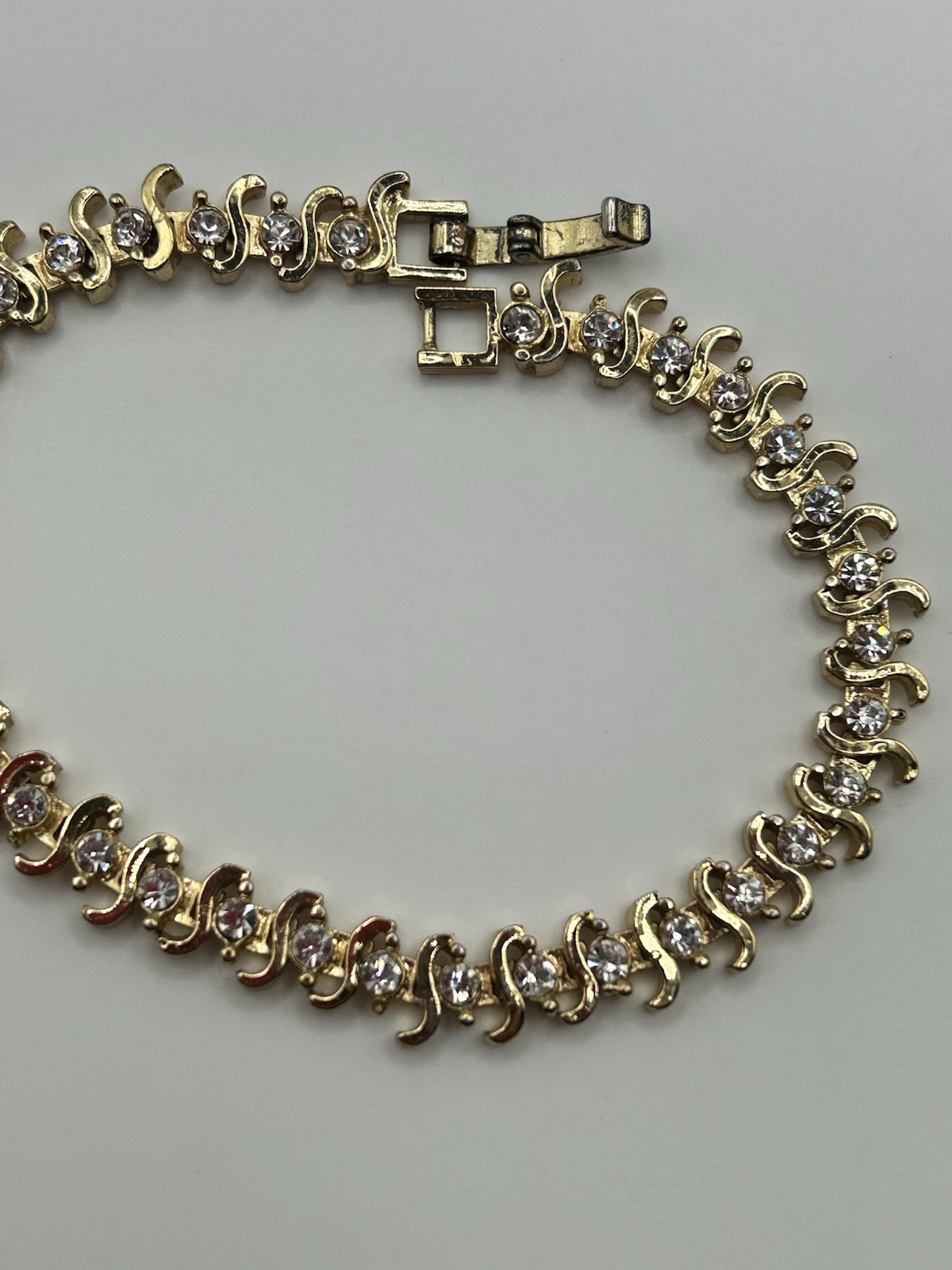 Gold Plated Tennis Bracelet w/35 Clear Sparkling glass Rhstones, 7 1/4″ x 5/16″