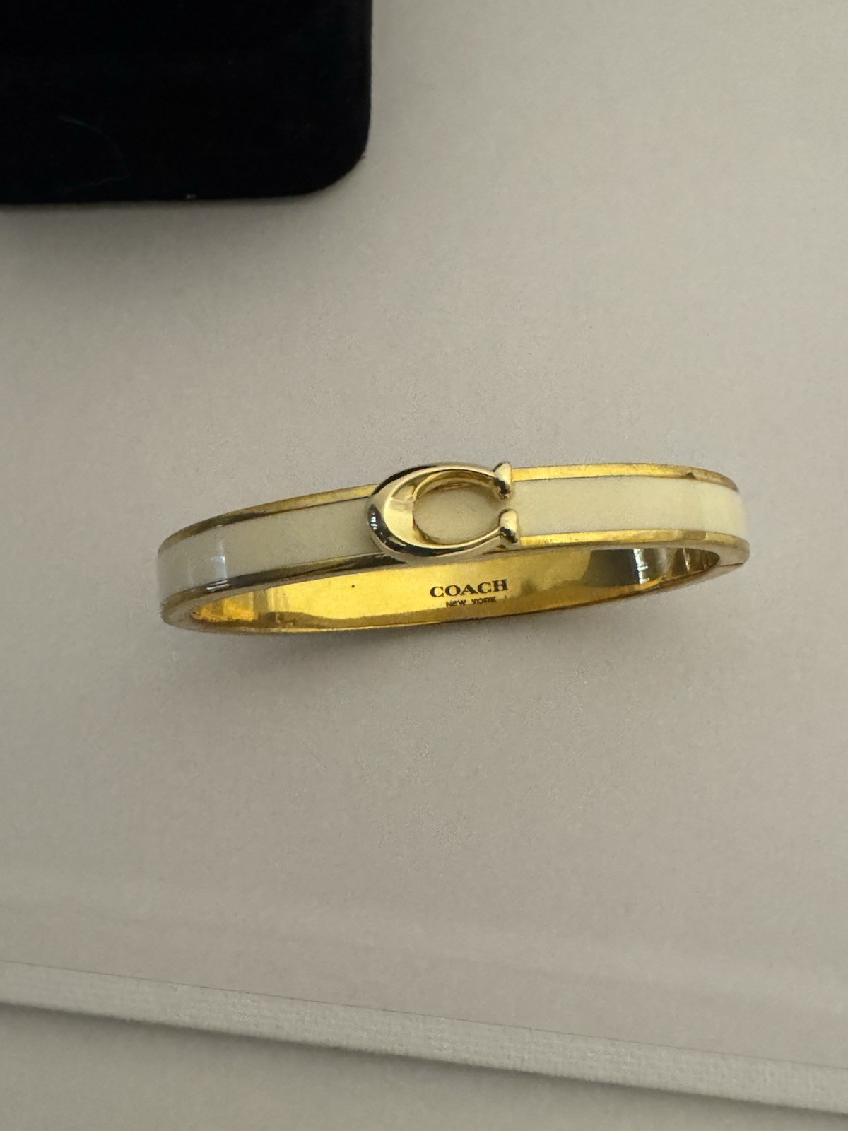 Coach Gold Tone White Enamel Oval Bangle Bracelet Signed No Stone