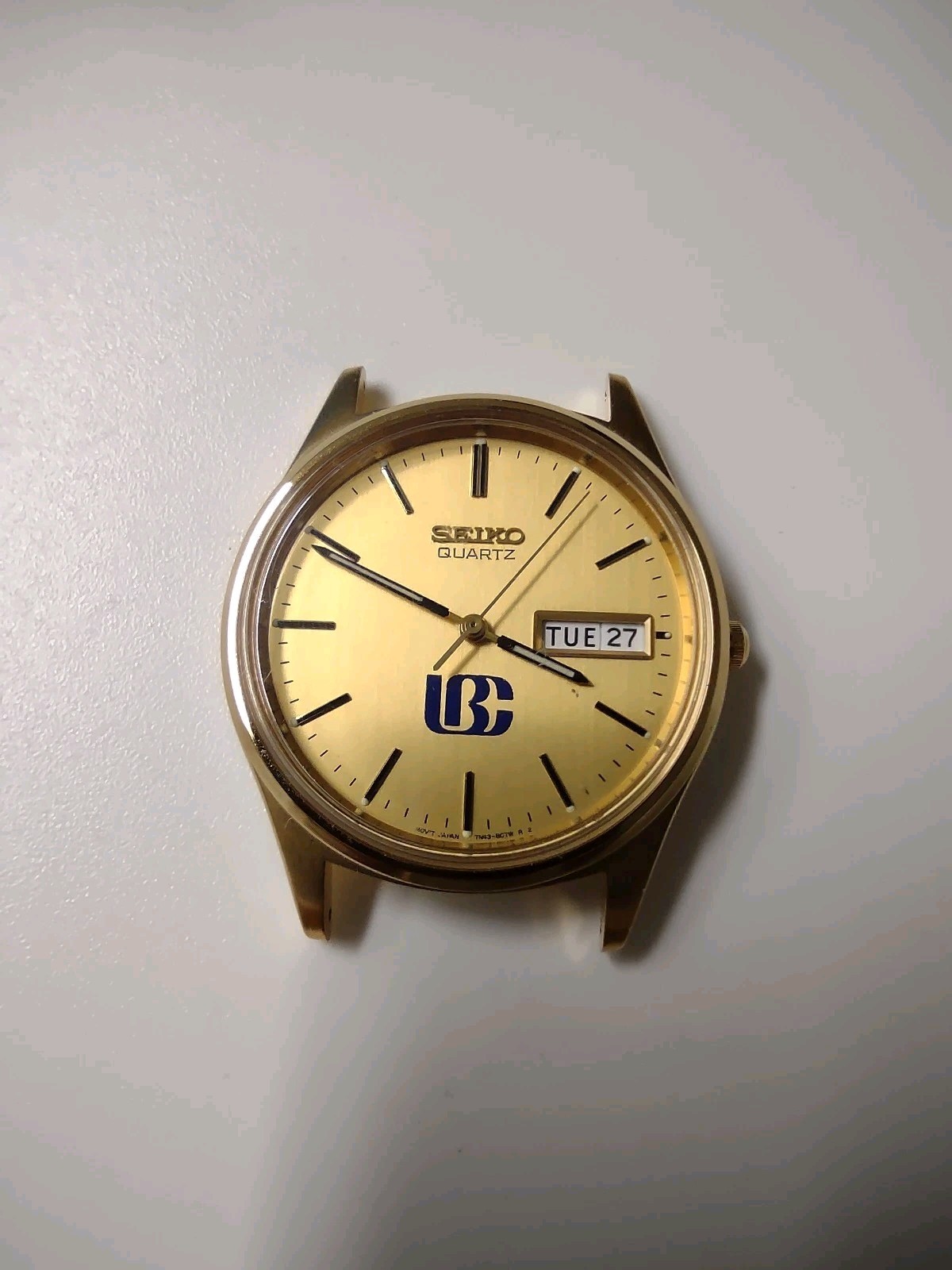 Seiko Quartz Men’s Gold Dial Day/Date Stick Indexes Gold Metal Wristwatch