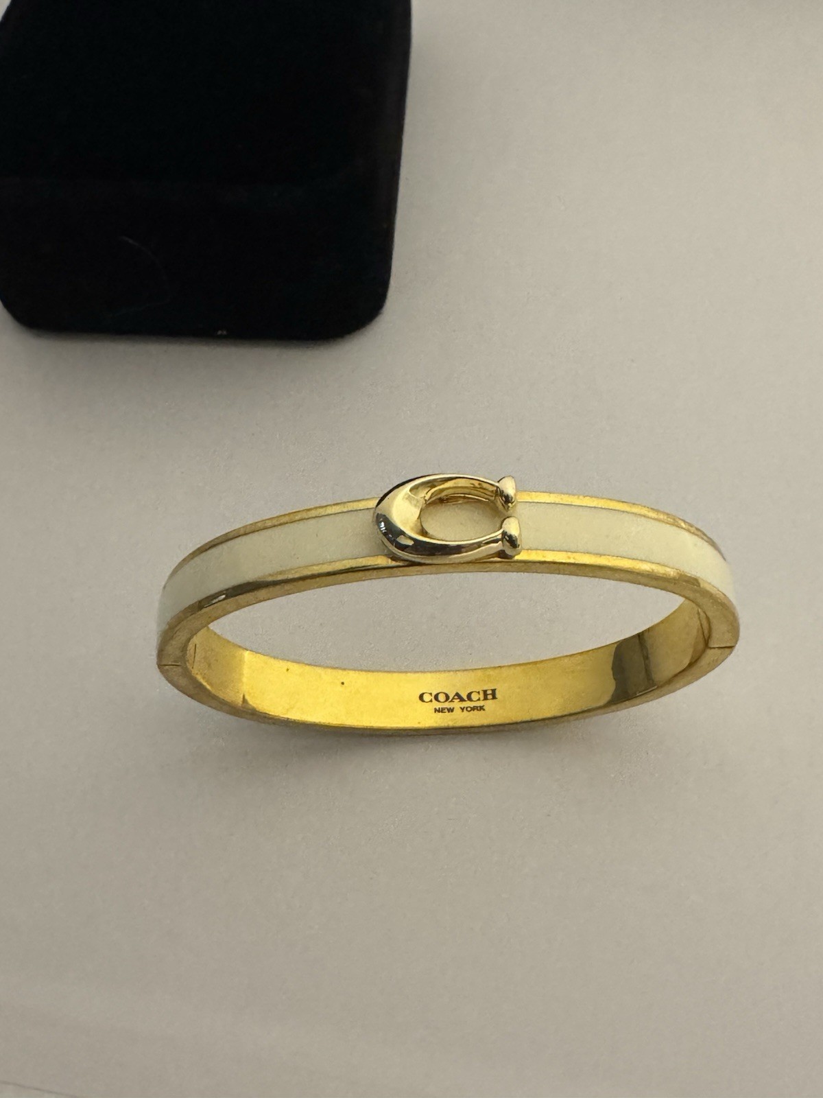 Coach Gold Tone White Enamel Oval Bangle Bracelet Signed No Stone