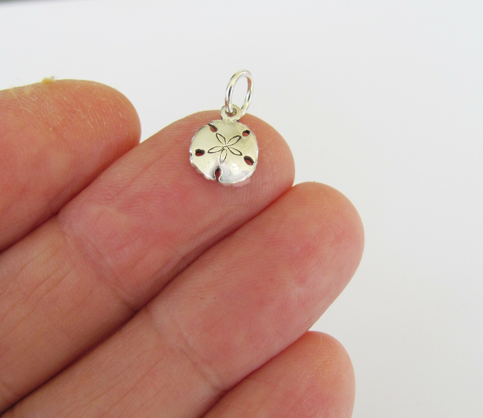 Very small Sterling Silver Sand dollar mini tiny charm.