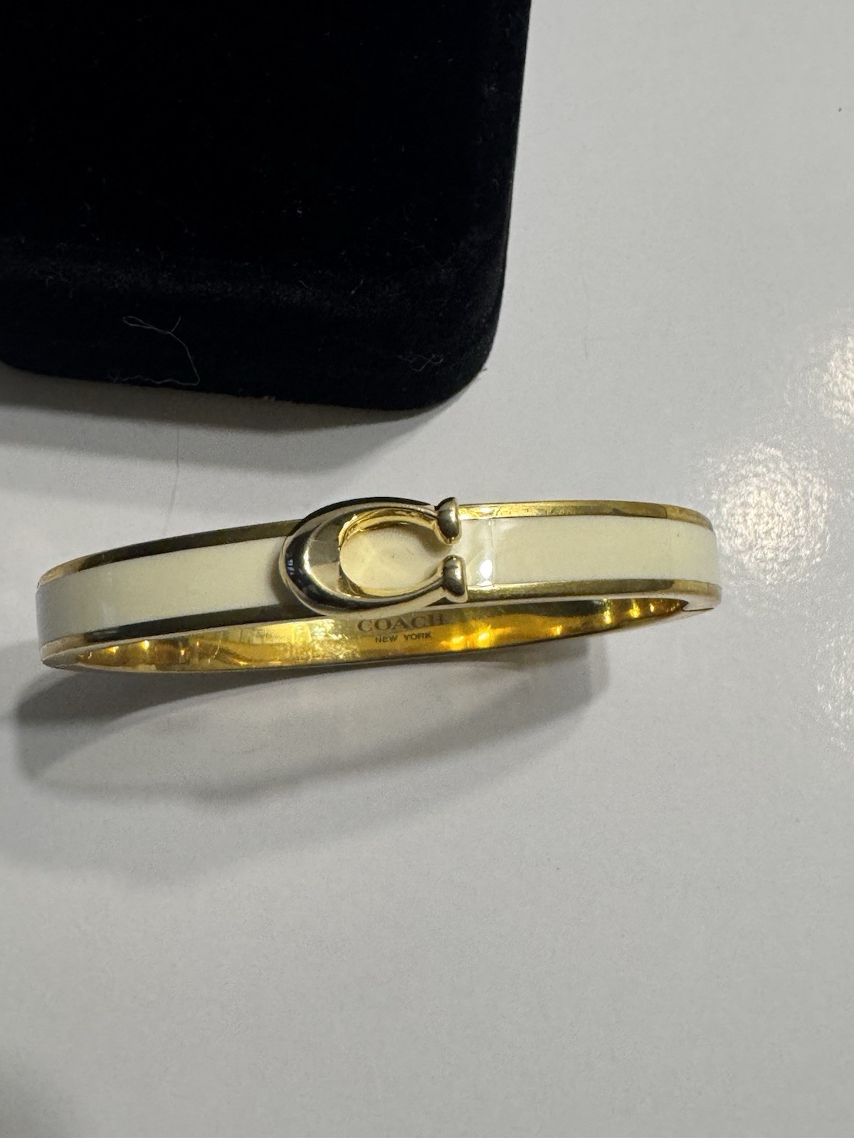 Coach Gold Tone White Enamel Oval Bangle Bracelet Signed No Stone