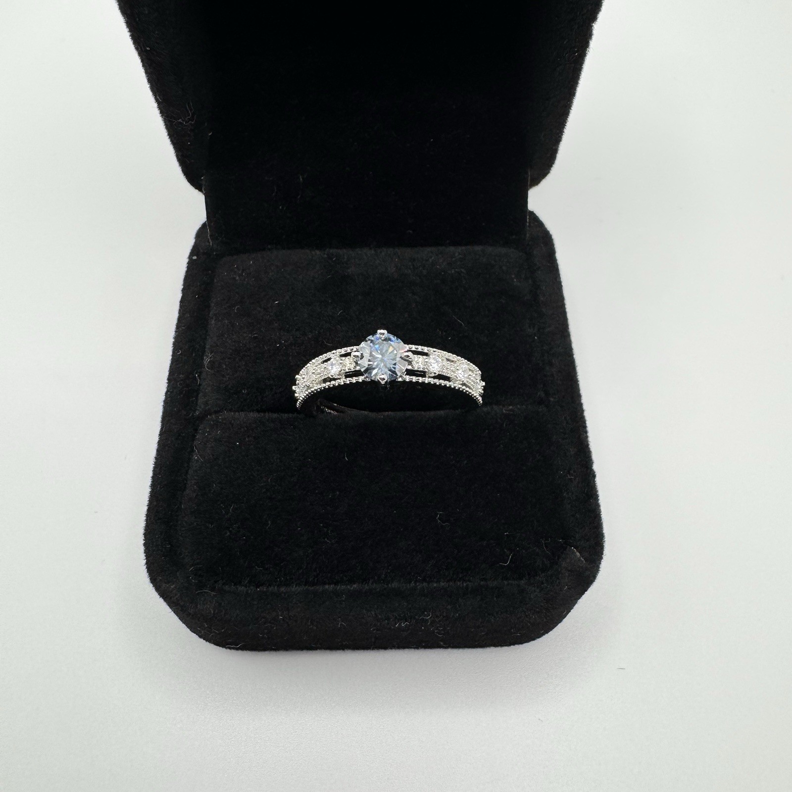 Vintage Style Silvertone Adjustable Ring With Blue CZ Stone