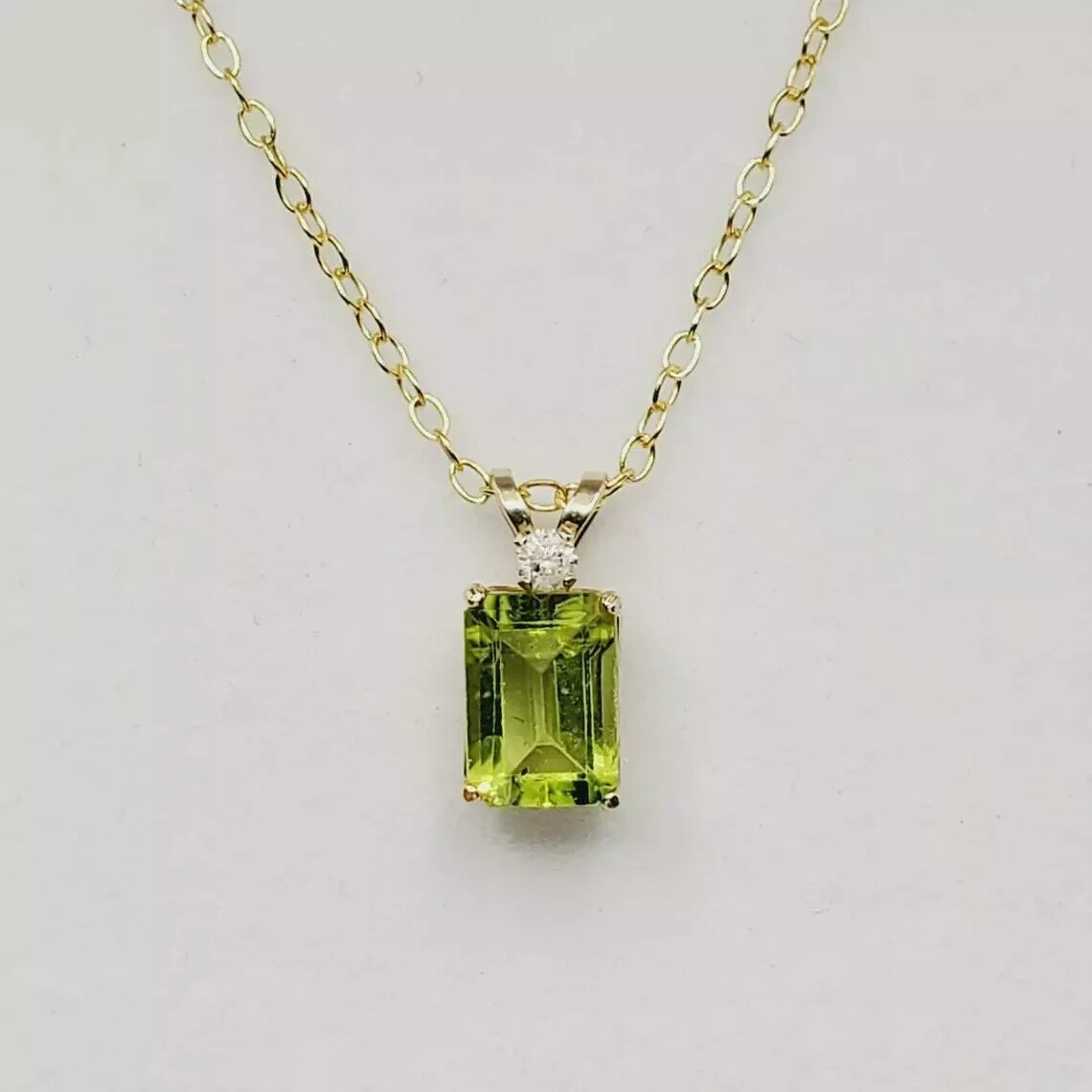 2Ct Emerald Cut Green Peridot Solitaire Women Pendant 14K Yellow Gold Free Chain