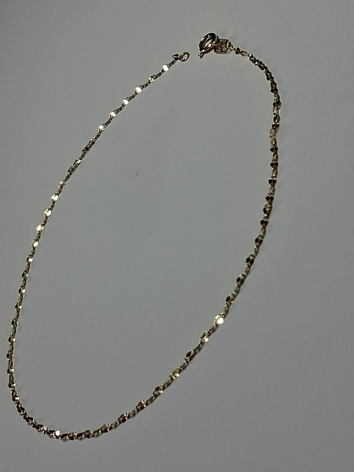 10k Gold Mirror Link 10″ Anklet 1.3mm, .4gr