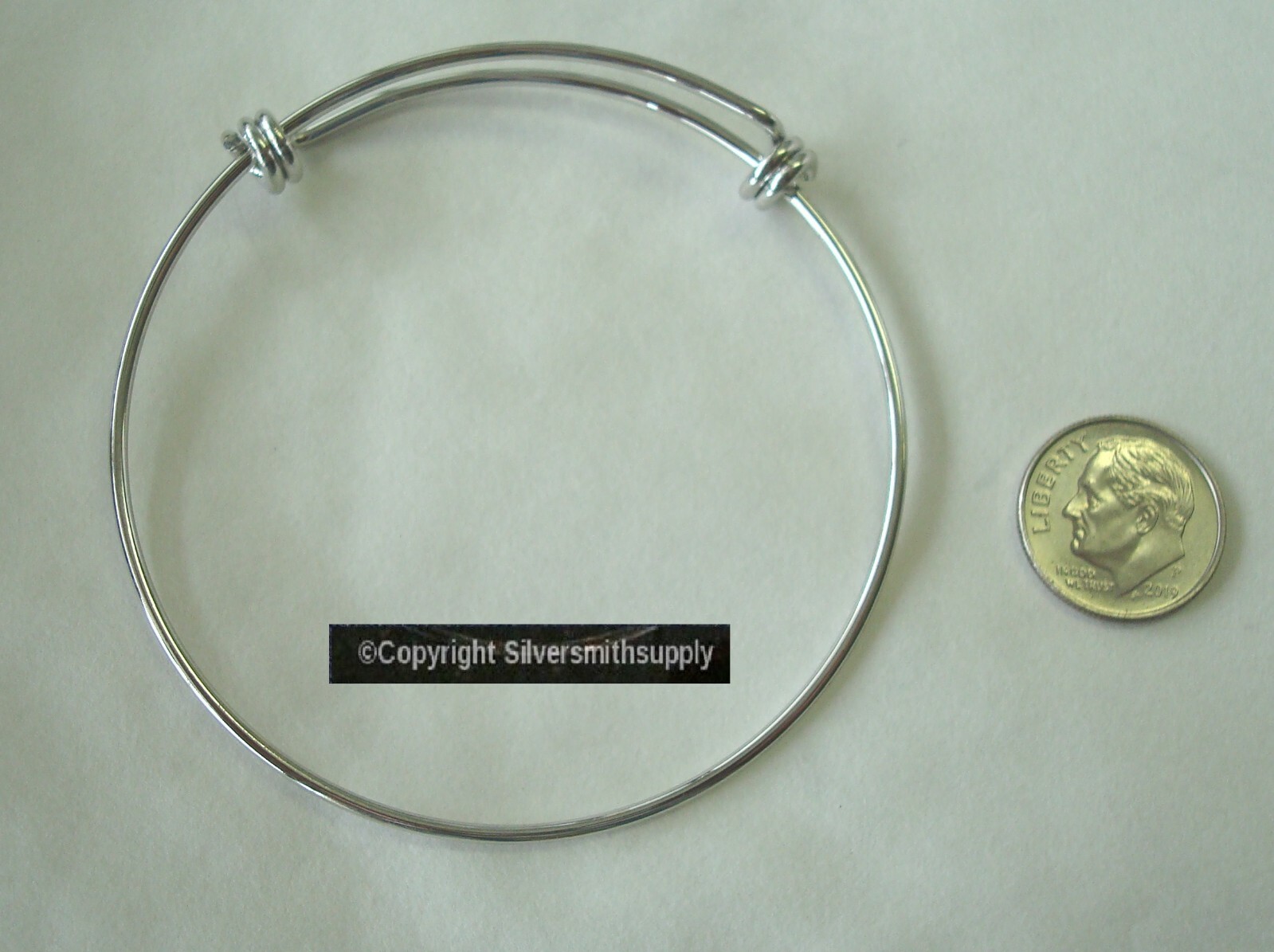 Bangle bracelet adjustable size from 7-9 in wrapped coil ends adjustable FJ058