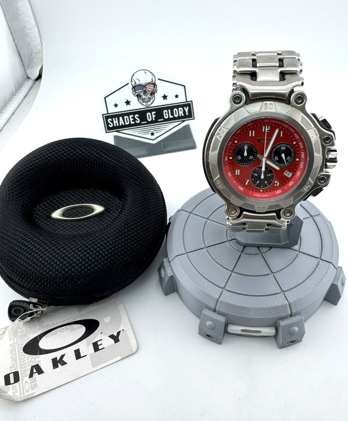 OAKLEY CRANKCASE 6-HAND WATCH POLISHED STAINLESS STEEL BRACELET RED DIAL 10-253