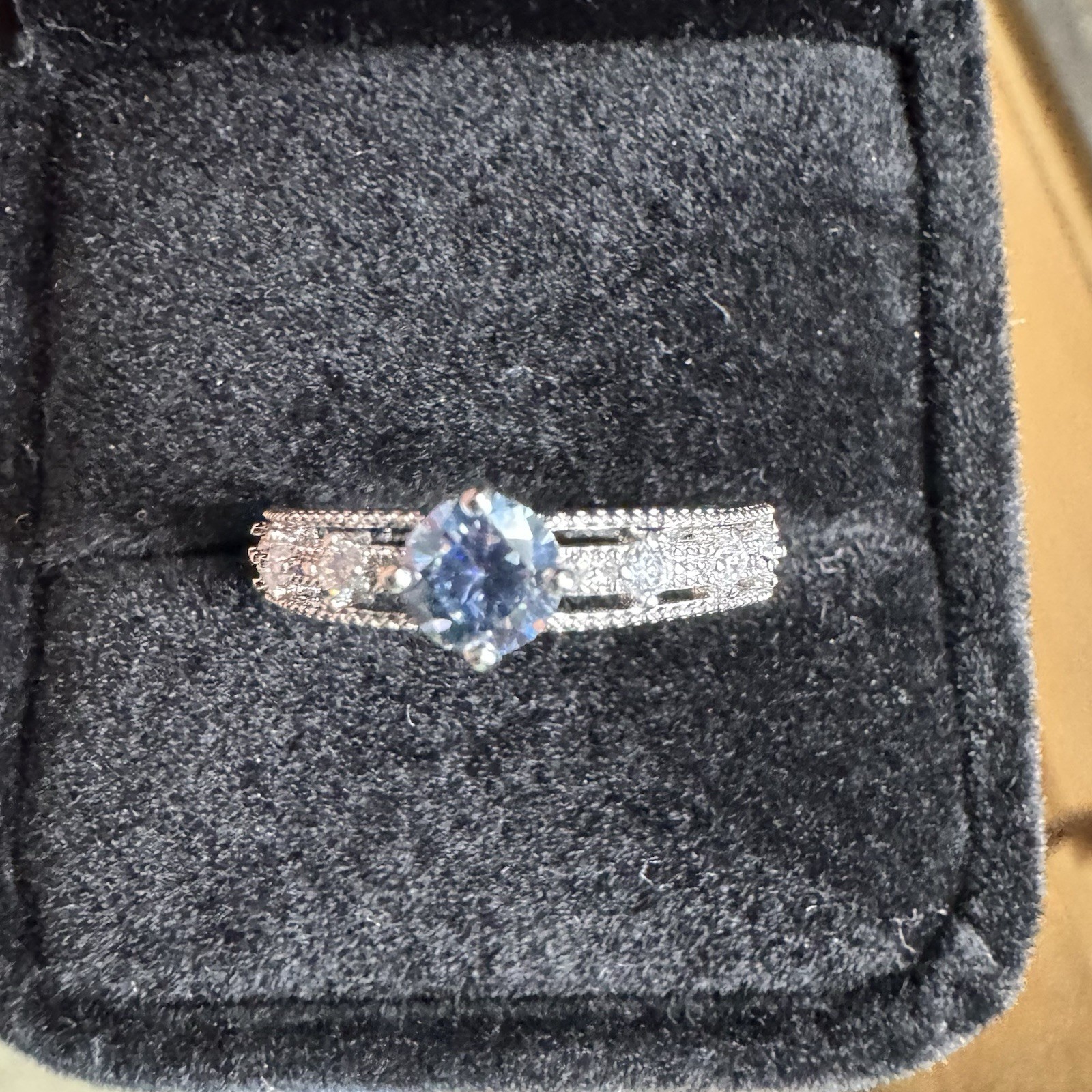 Vintage Style Silvertone Adjustable Ring With Blue CZ Stone