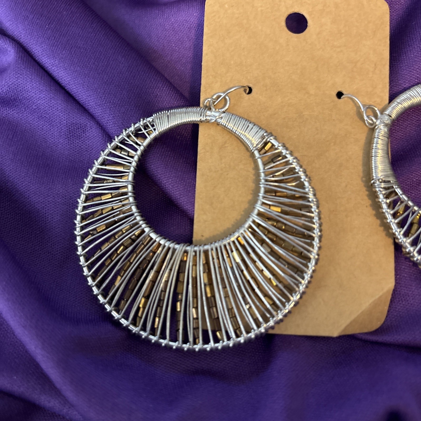 large silver wire wrapped hoop earrings w/ pewter beads.