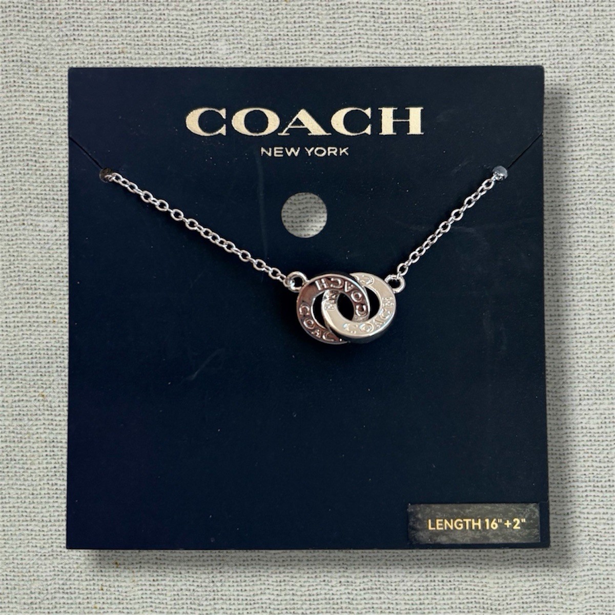 Authentic Coach Silver Interlocking Ring Necklace 16″+2″ Chain New w/ Card