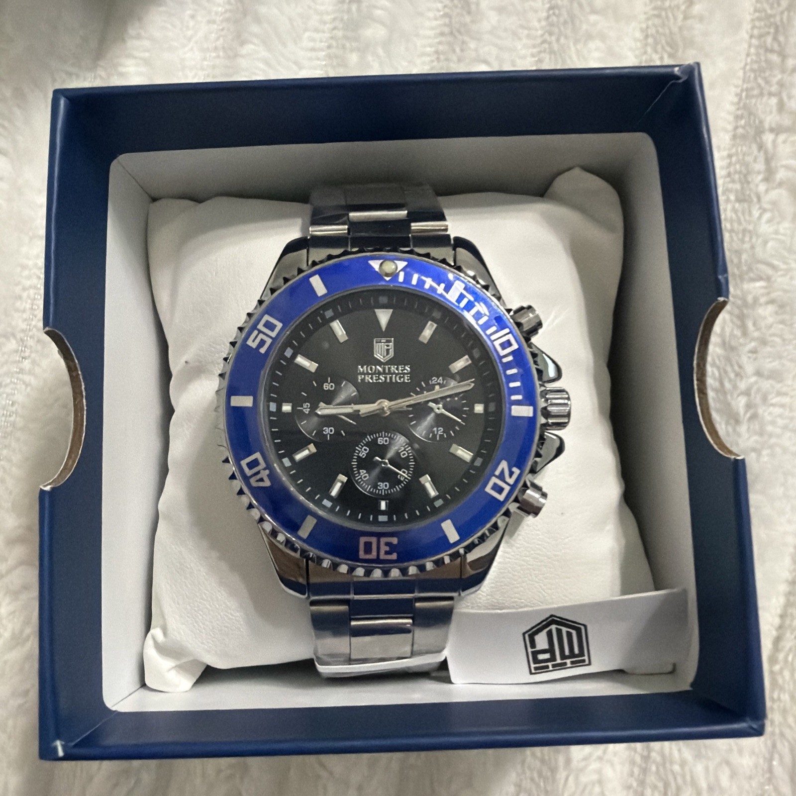 MPW0089 Montres Prestige x Invicta Mens 42mm Watch Silver Black Dial Blue Bezel.