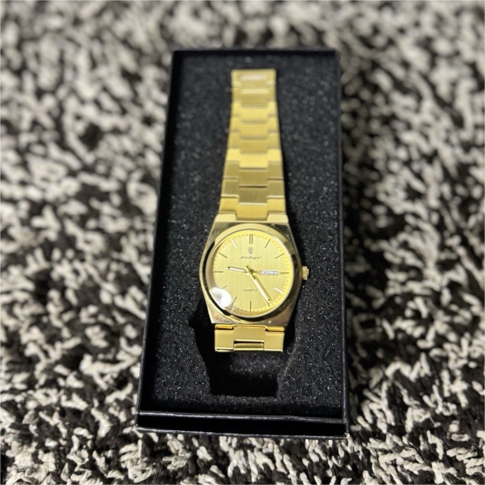 Prestige Quartz Analog Day/Date Gold Dial Stick Indices Bracelet Fixed Bezel