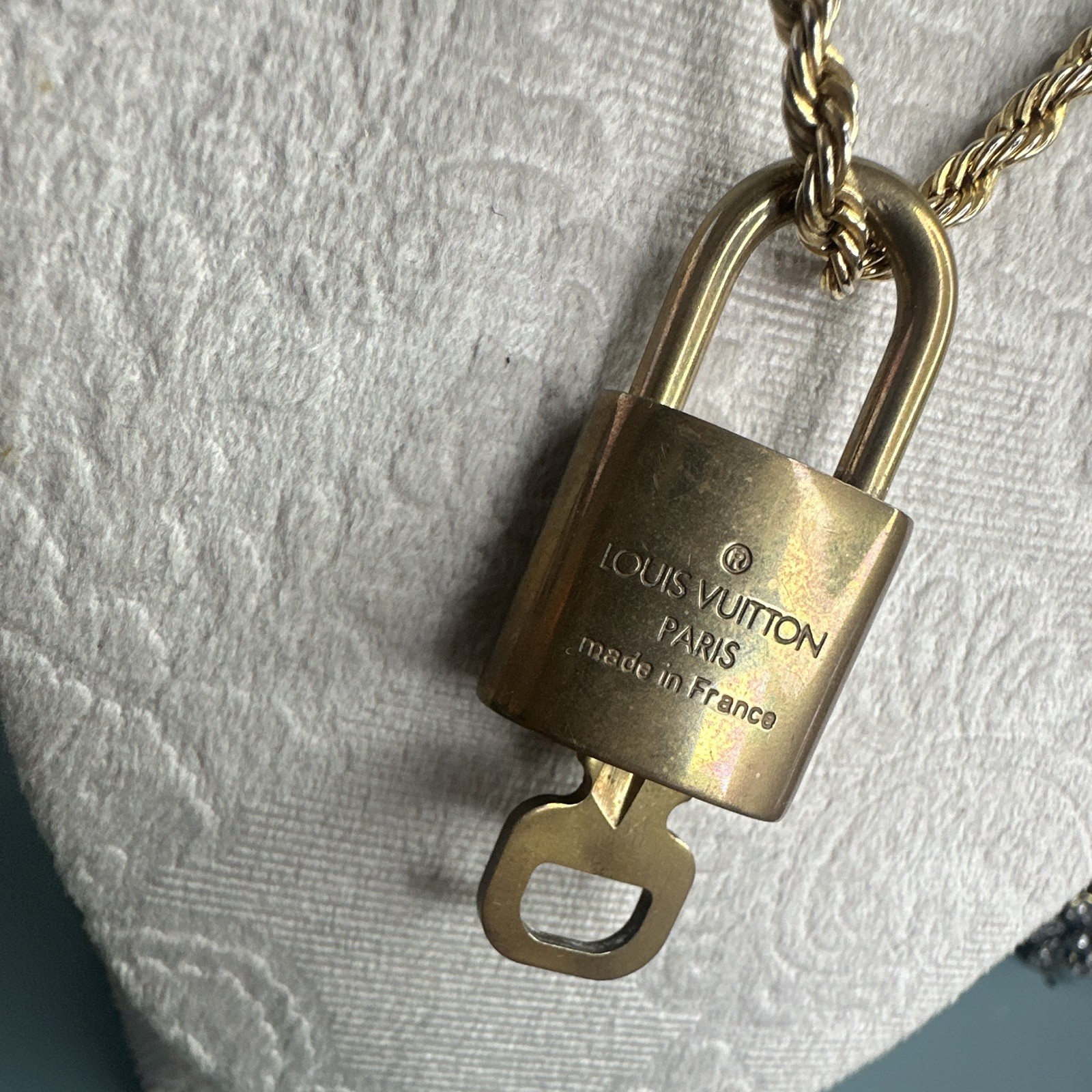 Louis Vuitton Signed Gold Tone Padlock Charm and key. #313