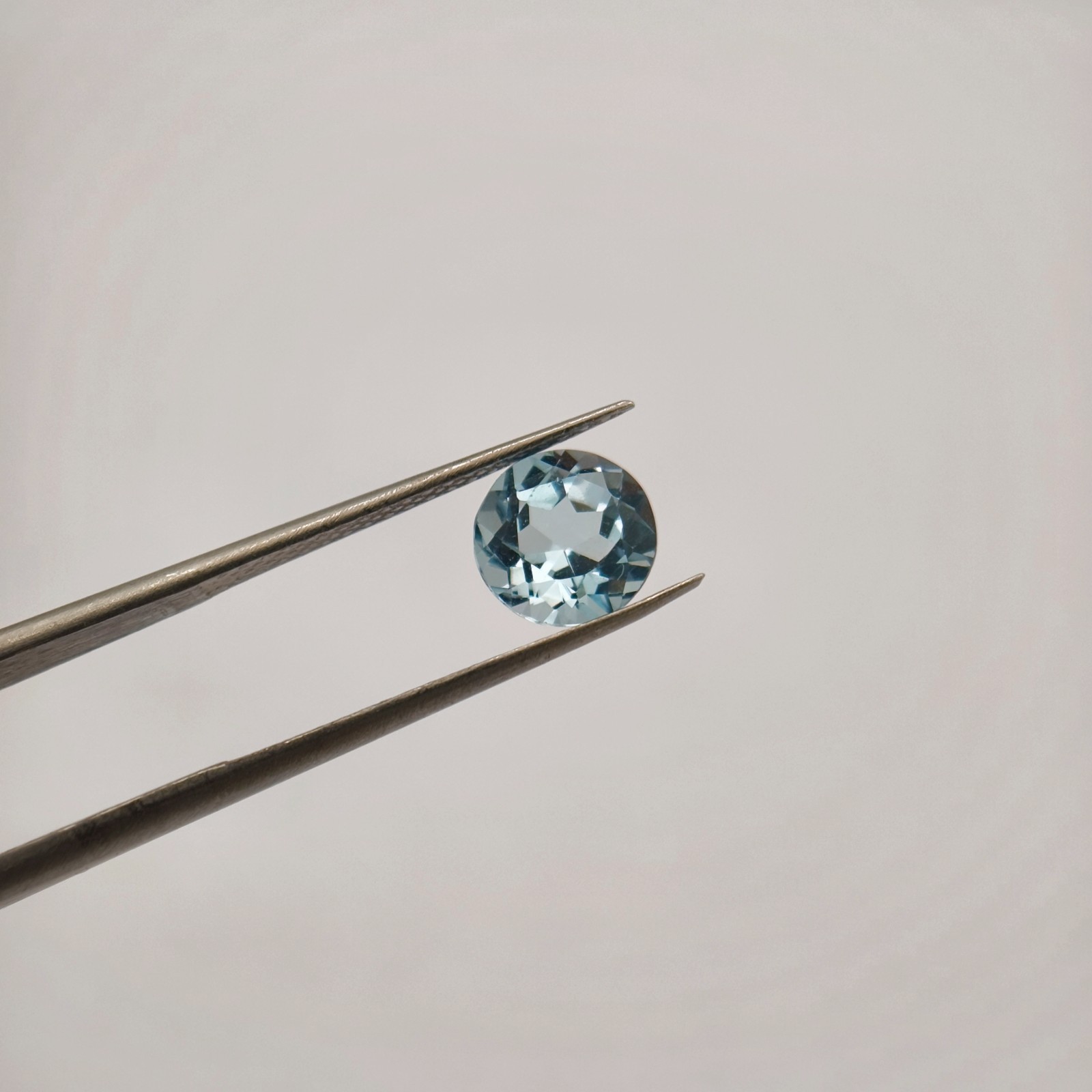Natural Blue Topaz Oval Step Cut 6.9×6.9 mm 1.35 Ct Transparent Brazil