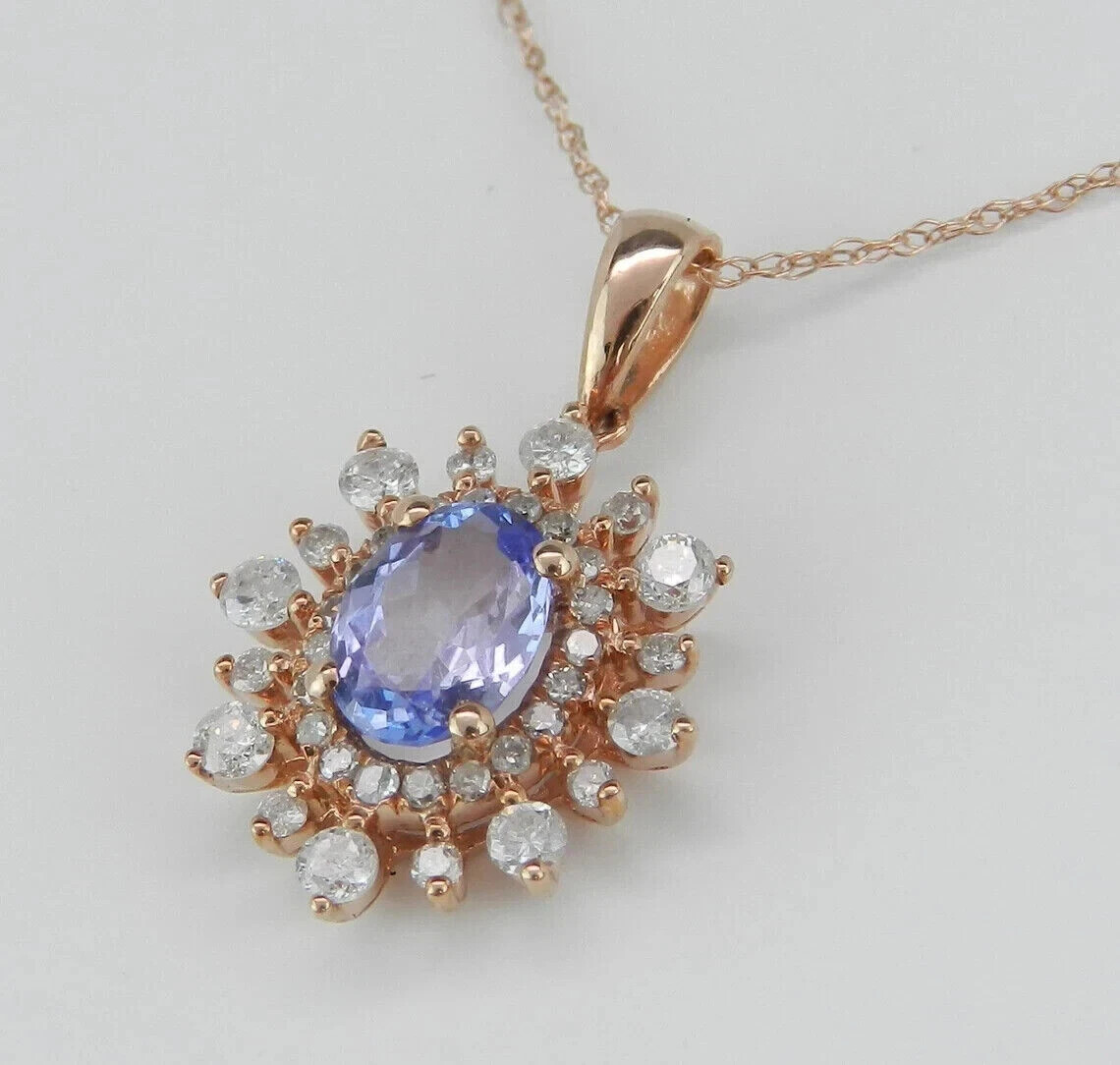 2Ct Oval Cut Lab-Created Tanzanite Halo Snowflake Pendant 14K Yellow Gold Plate