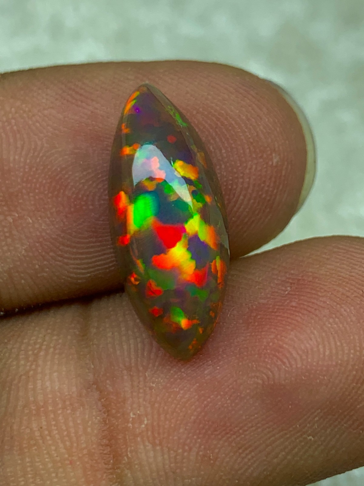 Shewa Chocolate Ethiopian Opal Gemstone 4.55 Carat Multi-Fire Marquise Cabochon