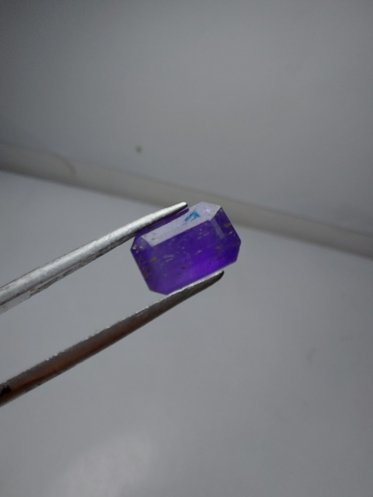 1.35- carat fluorescent Tenebrecent hackmanite cut from Badakhshan Afghanistan