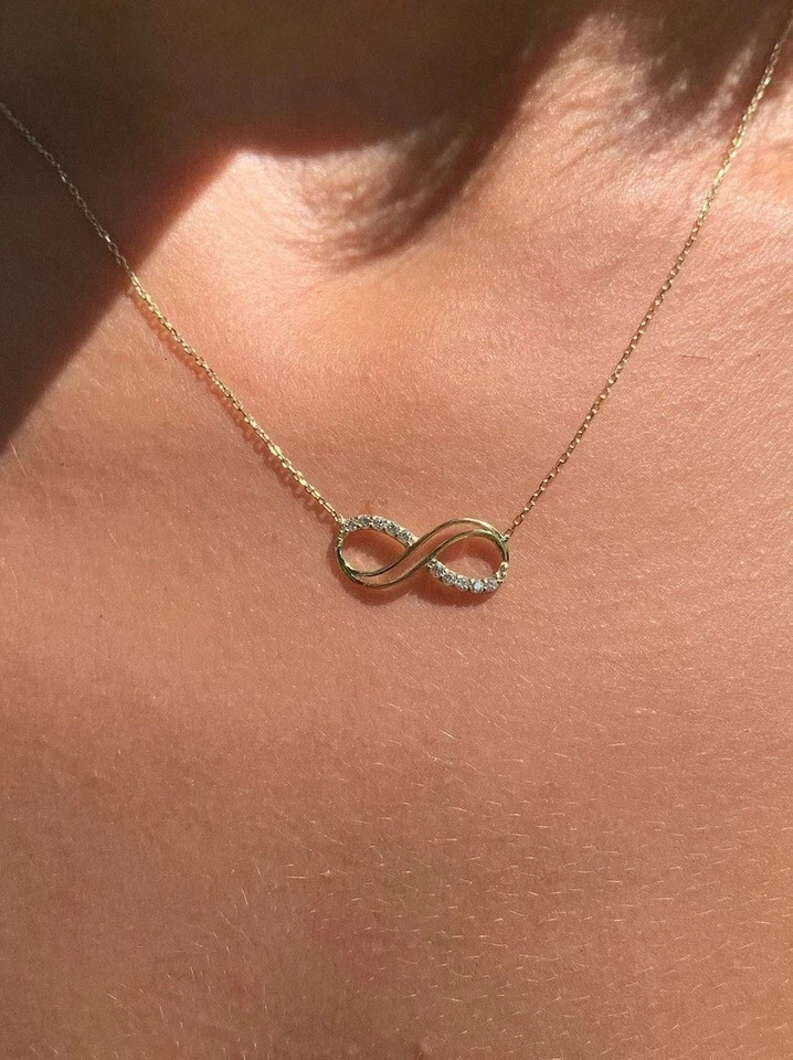Round Cut Simulated Diamond Stunning Infinity Pendant In 14K Yellow Gold Plated