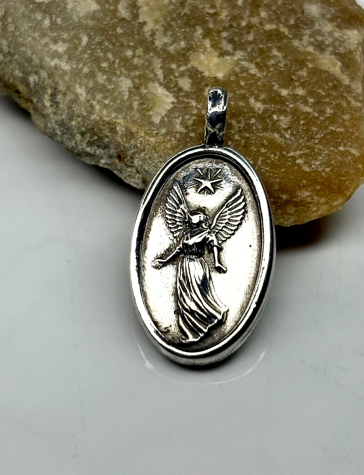 Fine pure Silver 999. guardian angel Minimalist Pendant