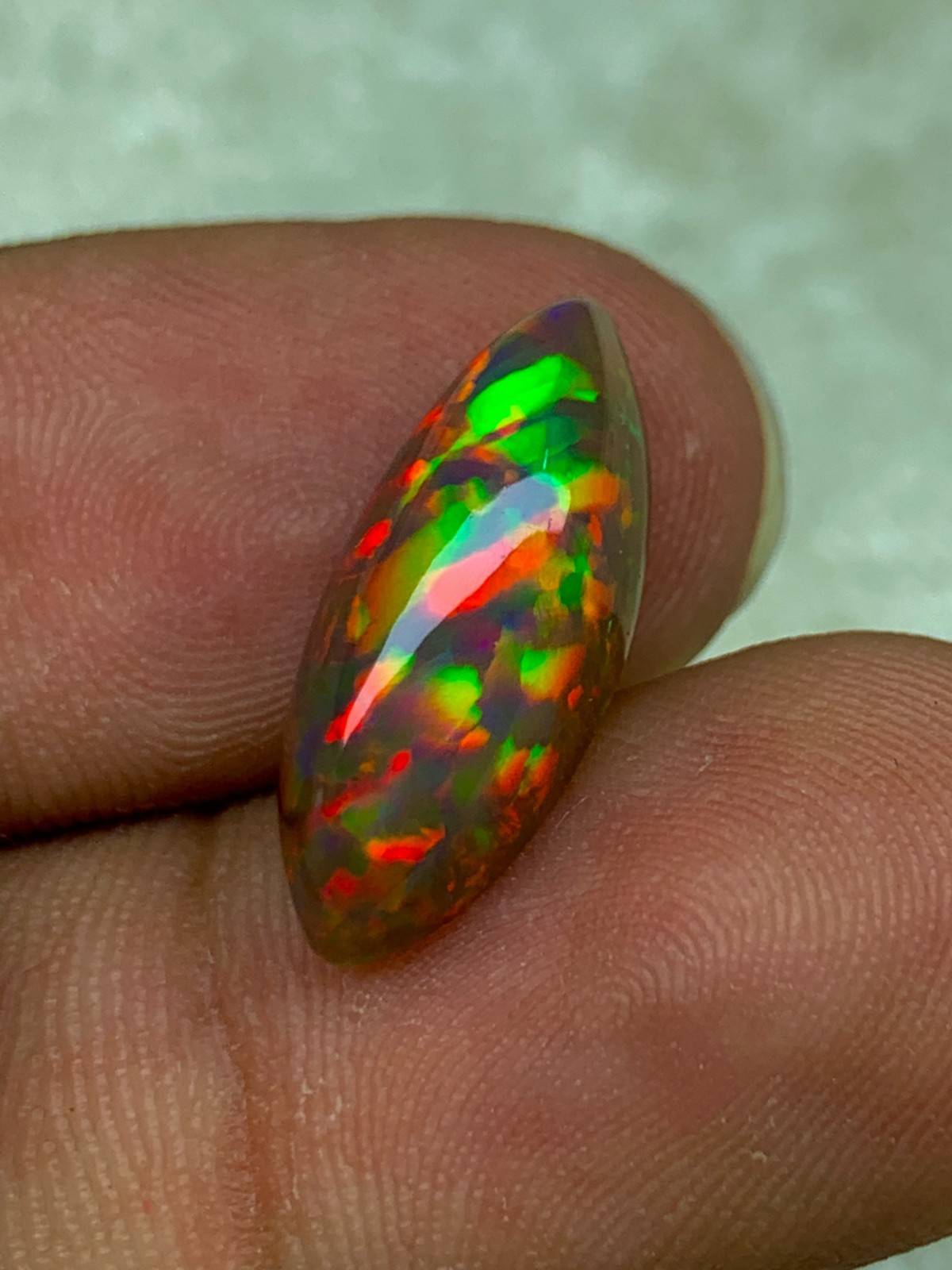 Shewa Chocolate Ethiopian Opal Gemstone 4.55 Carat Multi-Fire Marquise Cabochon